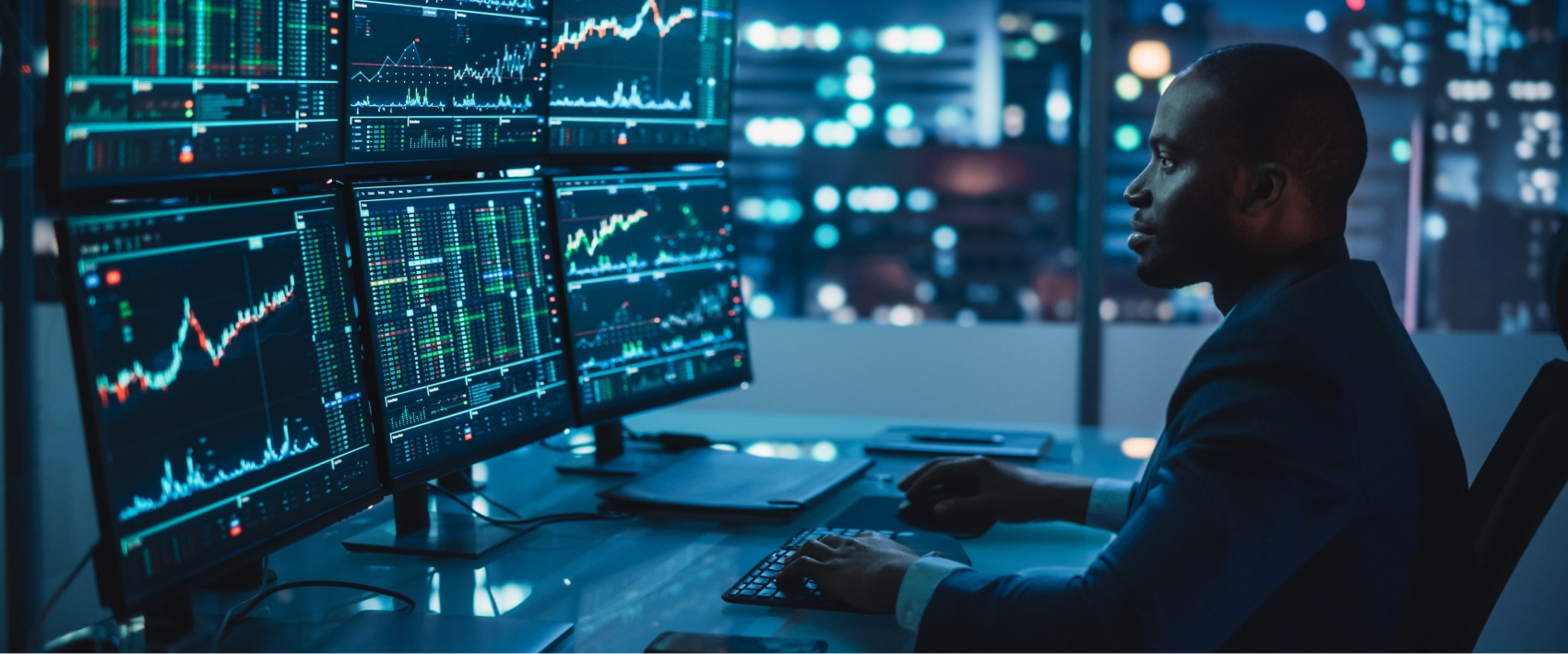 a man looking at the results of the financial market/stock exchange